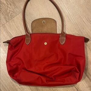 Red long champ Tote Bag